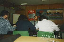 Carlos Romero Gonzalez en una reunión