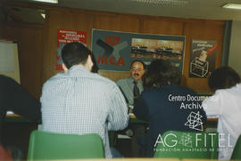 Carlos Romero Gonzalez en una reunión